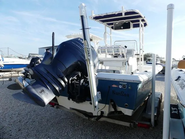 Slide: The Image of 2010 Sea Hunt BX 22 Pro boat with Yamaha outboard motor on trailer. - 6