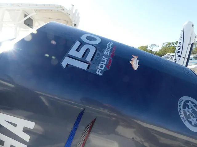 Slide: The Image of Yamaha 150 horsepower four-stroke outboard motor on a 2010 Sea Hunt BX 22 Pro boat. - 7