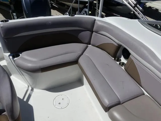 Slide: The Image of 2018 Hurricane SD 2200 OB boat interior with gray seating and cup holders. - 11