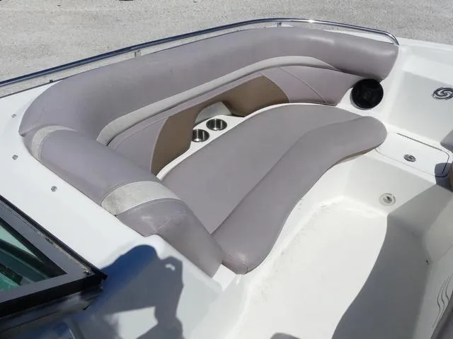 Slide: The Image of 2018 Hurricane SD 2200 OB boat interior with gray seating and cup holders. - 14