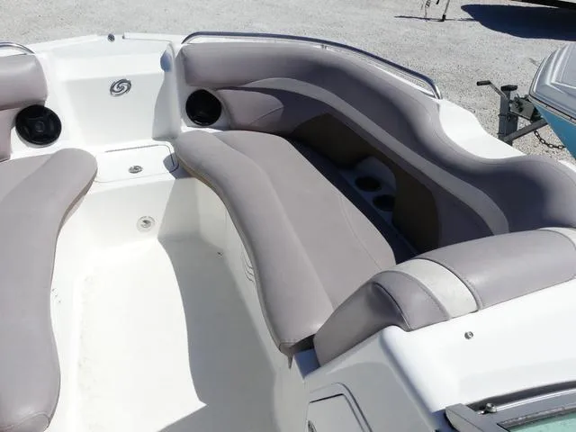 Slide: The Image of 2018 Hurricane SD 2200 OB boat interior with gray cushioned seating. - 15