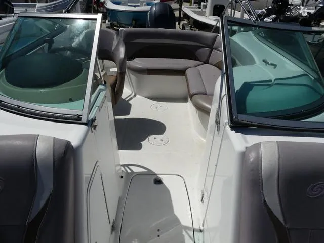 Slide: The Image of 2018 Hurricane SD 2200 OB boat interior with seating and open deck layout. - 16