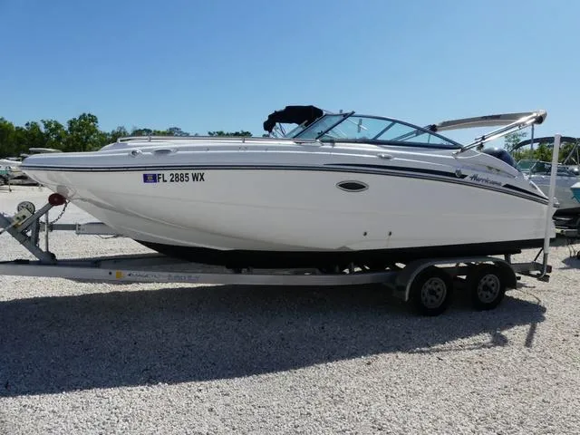Slide: The Image of 2018 Hurricane SD 2200 OB boat on trailer, parked on gravel lot. - 21