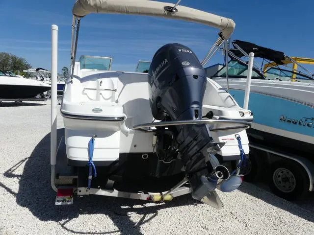 Slide: The Image of 2018 Hurricane SD 2200 OB boat with Yamaha outboard motor, parked on gravel. - 22