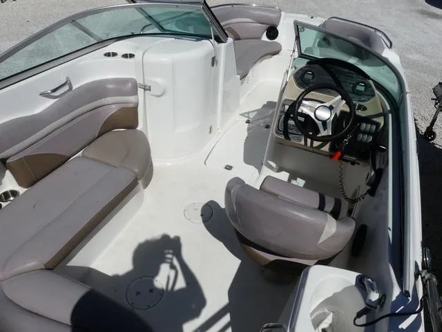 Slide: The Image of 2018 Hurricane SD 2200 OB boat interior with seating and steering console. - 24
