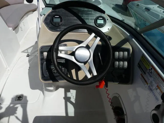 Slide: The Image of Steering console of 2018 Hurricane SD 2200 OB boat with modern controls and gauges. - 26