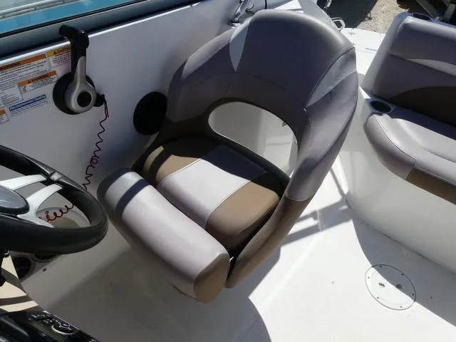 Slide: The Image of Captain's seat on 2018 Hurricane SD 2200 OB boat, featuring ergonomic design and neutral colors. - 27
