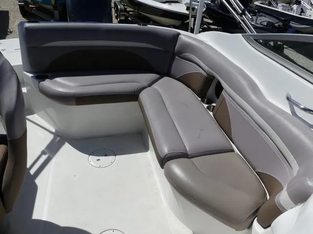 Slide: The Image of 2018 Hurricane SD 2200 OB boat interior with cushioned seating area. - 28