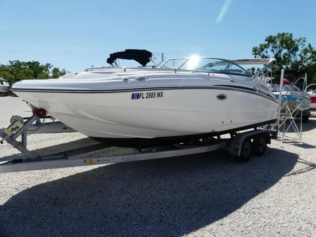 Slide: The Image of 2018 Hurricane SD 2200 OB boat on trailer, parked outdoors under clear sky. - 3