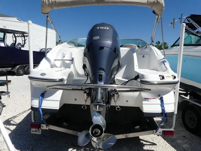Slide: The Image of 2018 Hurricane SD 2200 OB boat with outboard motor, parked on a trailer. - 5