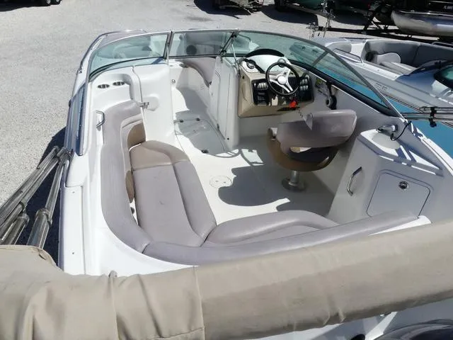 Slide: The Image of 2018 Hurricane SD 2200 OB boat interior with seating and steering console. - 7