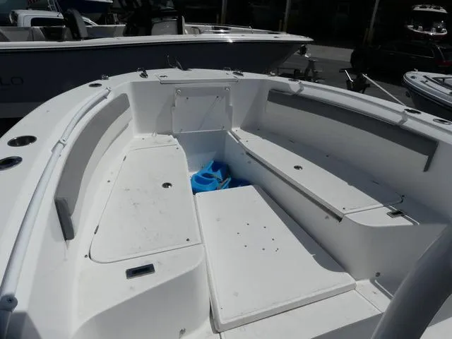 Slide: The Image of 2021 Release 240 RX boat interior with seating and storage compartments. - 12