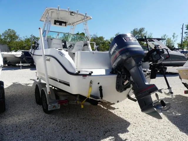Slide: The Image of 2002 Seaswirl Striper 2301 boat with Yamaha outboard motor on trailer. - 6