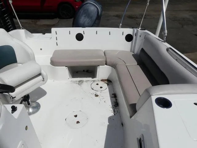 Slide: The Image of 2014 Hurricane SS 188 OB boat interior with seating and steering wheel. - 10