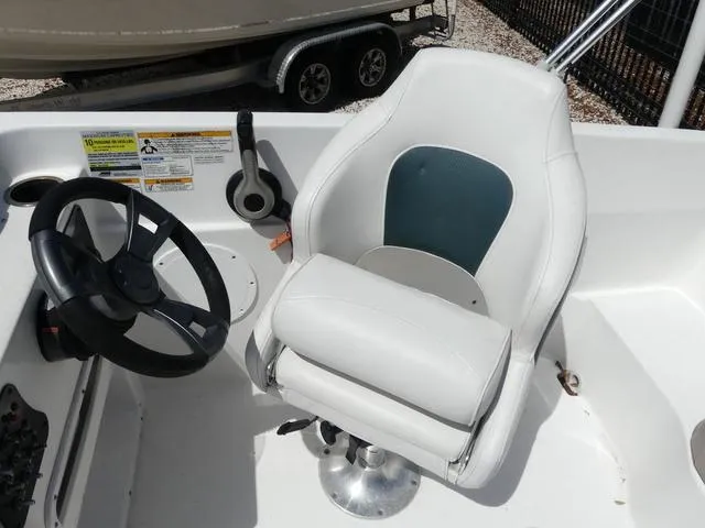 Slide: The Image of Captain's seat and steering wheel of 2014 Hurricane SS 188 OB boat. - 8
