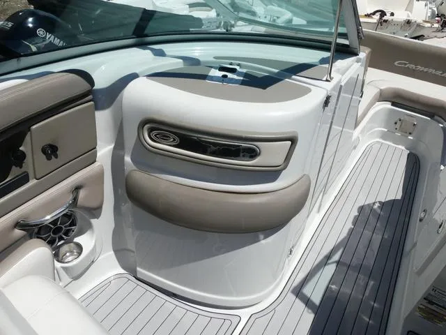 Slide: The Image of 2018 Crownline E23 XS boat interior with sleek seating and modern design. - 14