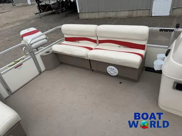 Slide: The Image of 2006 Sun Tracker Party Barge 20 Pontoon with beige and red seating, spacious deck. - 12