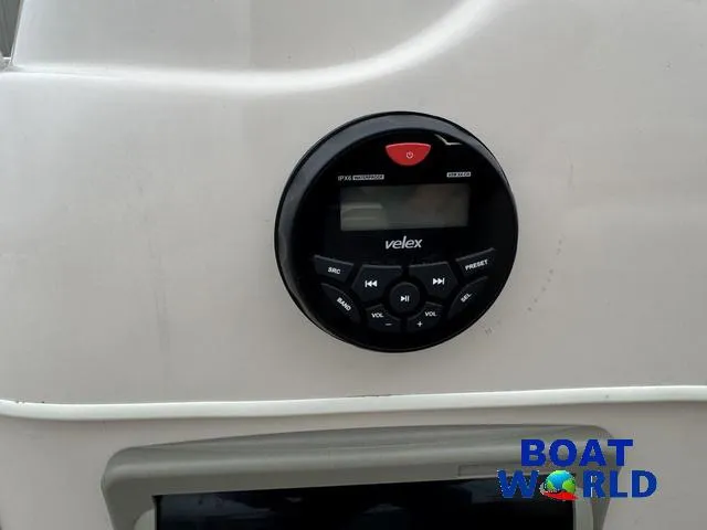 Slide: The Image of 2006 Sun Tracker Party Barge 20 Pontoon stereo system with Velex controls, Boat World logo. - 22