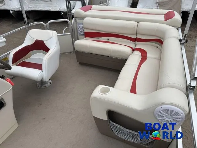Slide: The Image of 2006 Sun Tracker Party Barge 20 Pontoon interior with beige and red seating. - 24