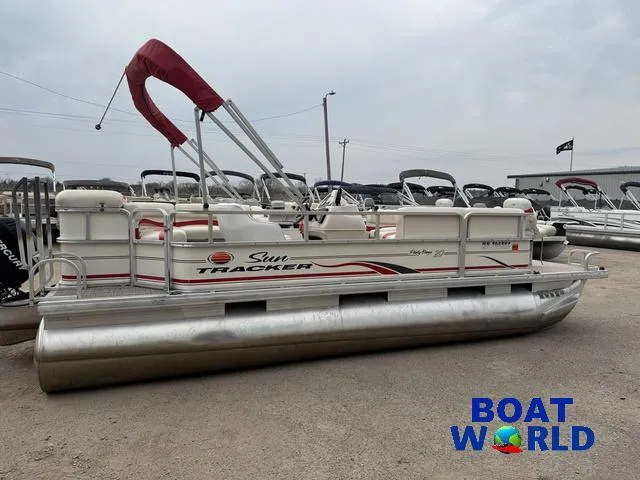 Slide: The Image of 2006 Sun Tracker Party Barge 20 Pontoon with red canopy, displayed at Boat World. - 30