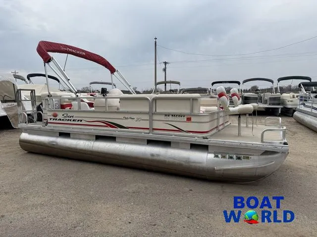 Slide: The Image of 2006 Sun Tracker Party Barge 20 Pontoon boat in a marina setting. - 33