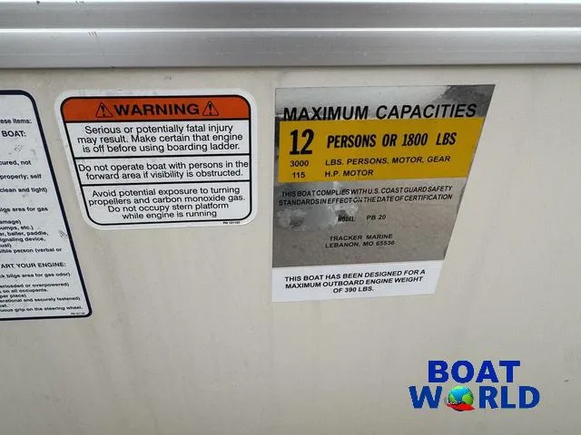 Slide: The Image of 2006 Sun Tracker Party Barge 20 Pontoon capacity warning labels, maximum 12 persons or 1800 lbs. - 45