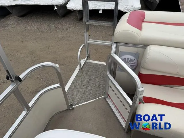 Slide: The Image of 2006 Sun Tracker Party Barge 20 Pontoon interior with seating and ladder, Boat World logo visible. - 6