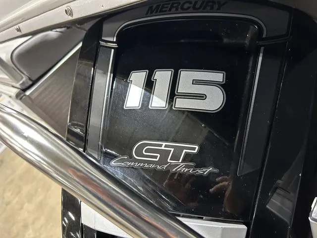 Slide: The Image of Mercury 115 Command Thrust engine on 1994 Harris-Kayot Heritage 2400 boat. - 10