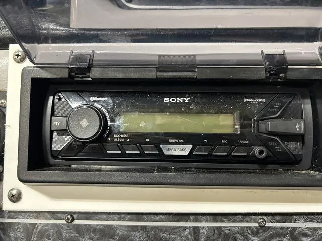 Slide: The Image of Sony car stereo system in a 1994 Harris-Kayot Heritage 2400 boat dashboard. - 21