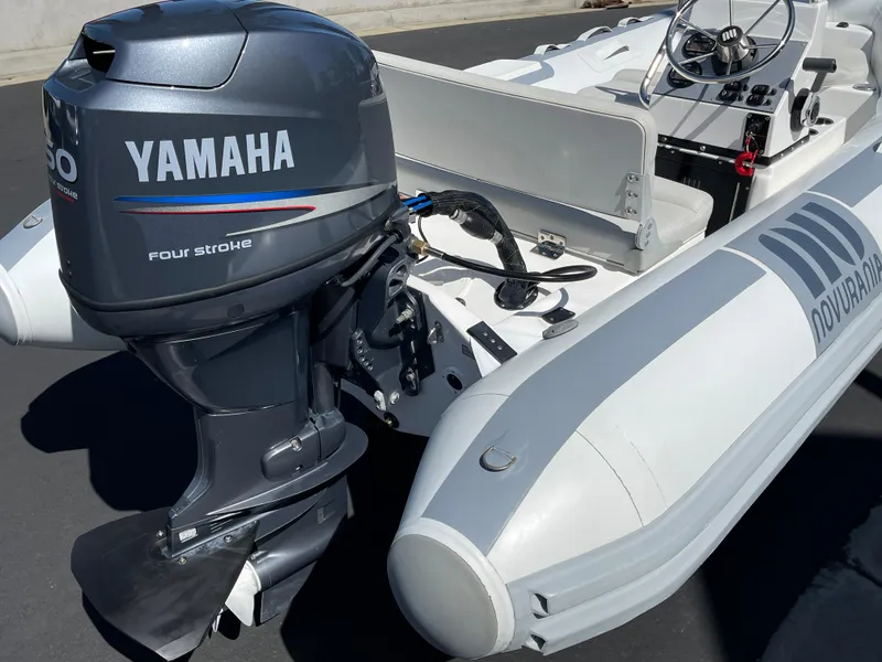 Slide: The Image of 2007 Novurania Deluxe 400 boat with Yamaha four-stroke outboard motor. - 6