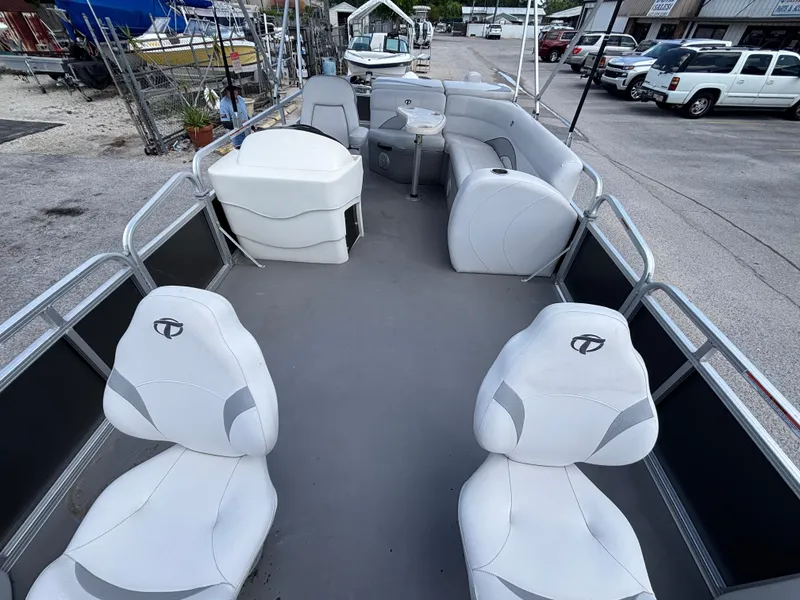 Slide: The Image of 2013 Tahoe Pontoon AF 2280 FF boat with spacious seating and modern design. - 11