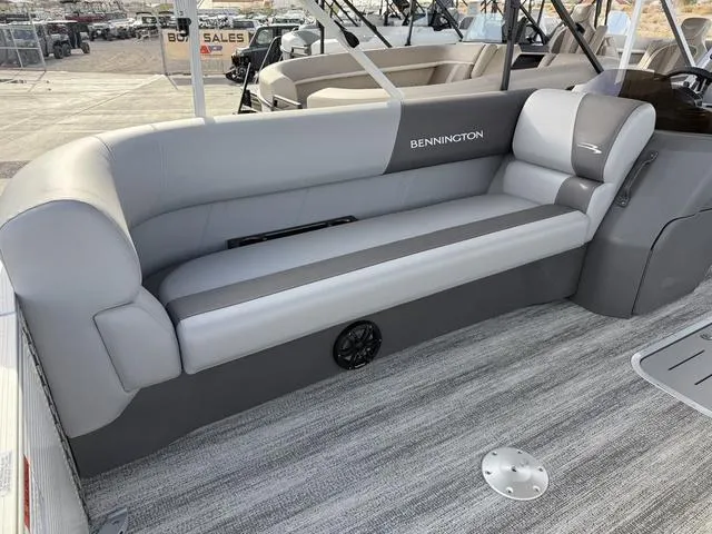 Slide: The Image of 2025 Bennington 21 S STERN RADIUS boat interior with gray seating and modern design. - 4
