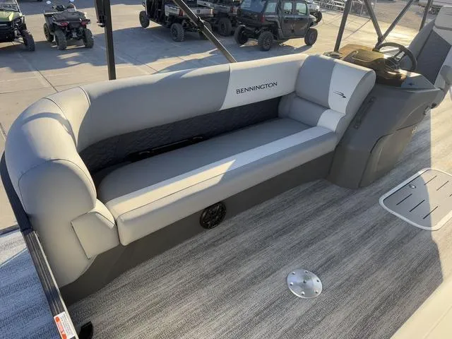 Slide: The Image of 2025 Bennington 22 S Cruise Jump boat interior with gray seating and modern design. - 5