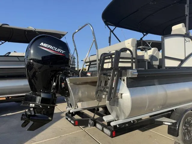 Slide: The Image of 2025 Bennington 22 S Cruise Jump pontoon boat with Mercury outboard motor. - 9