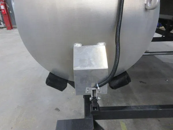 Slide: The Image of 2023 Sun Tracker Party Barge 18 DLX pontoon detail in a workshop setting. - 7