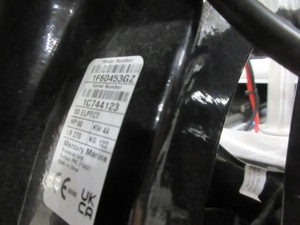 Slide: The Image of 2023 Sun Tracker Party Barge 18 DLX engine label with specifications and serial numbers. - 8