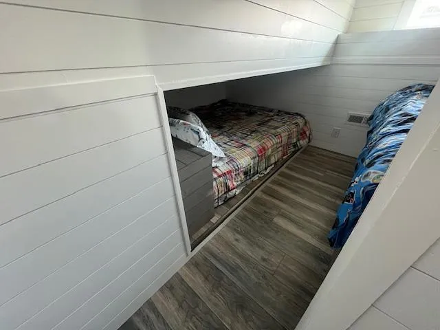 Slide: The Image of Compact bedroom with twin beds in a 2020 Harbor Cottage 16 x 84 model. - 15