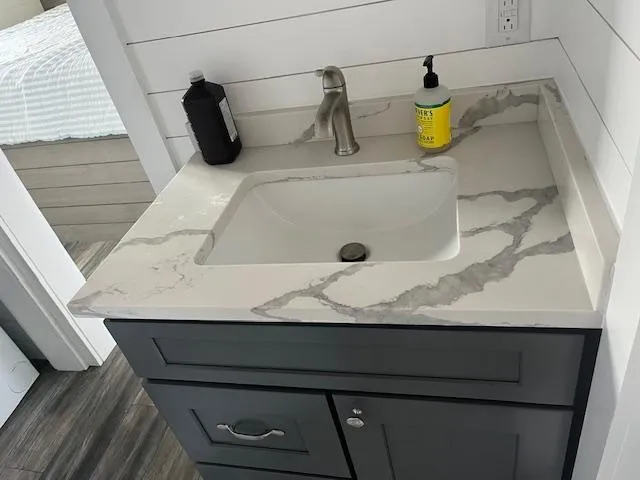 Slide: The Image of Modern bathroom sink with marble countertop in Harbor Cottage 16 x 84, 2020 model. - 22