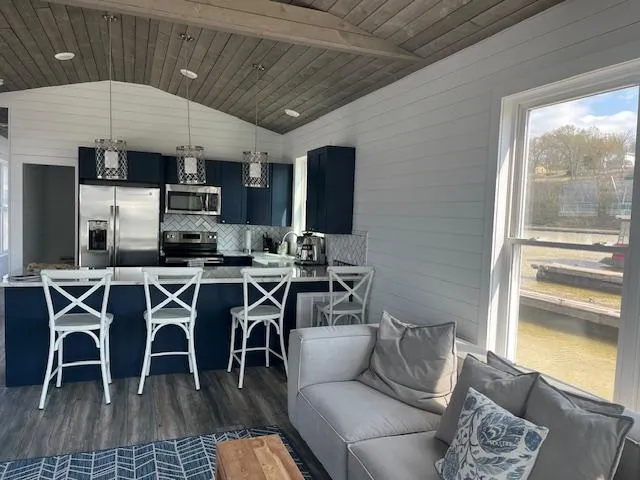 Slide: The Image of Modern kitchen and living area in 2020 Harbor Cottage 16 x 84 houseboat. - 7