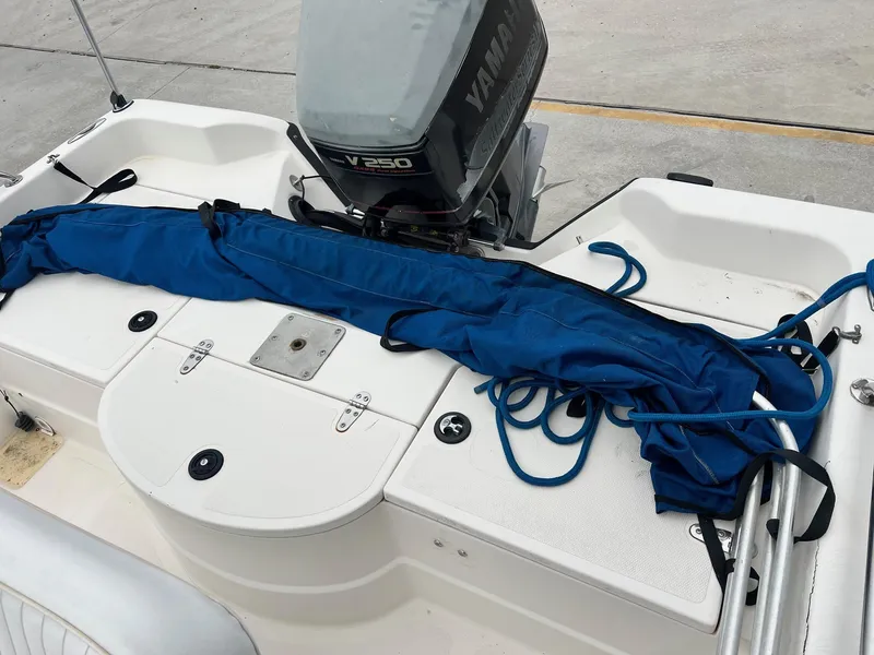 Slide: The Image of 2001 Skeeter ZX 2200 boat with Yamaha V250 engine and blue cover on deck. - 5