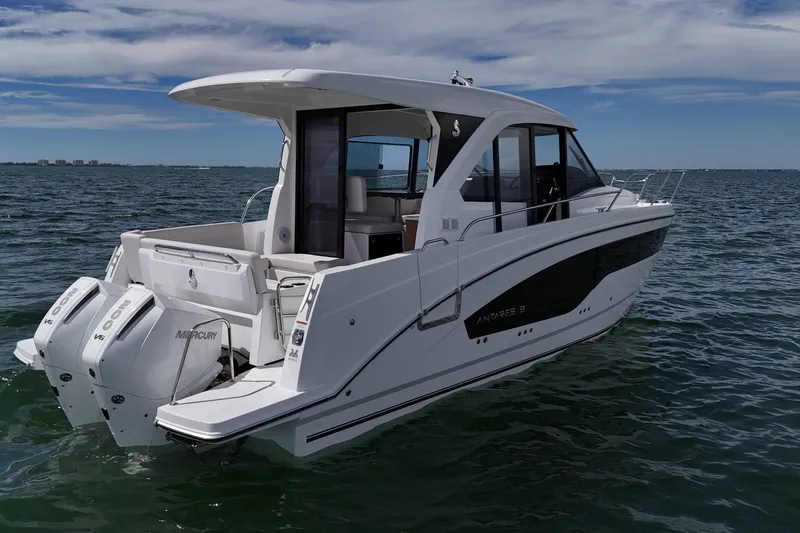 Slide: The Image of 2026 Beneteau Antares 9 V2 boat on water, featuring dual Mercury engines. - 9