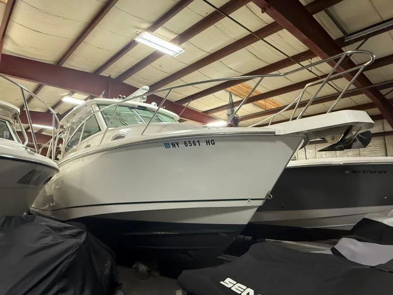 Slide: The Image of 2018 Boston Whaler 345 Conquest boat in indoor storage facility. - 0