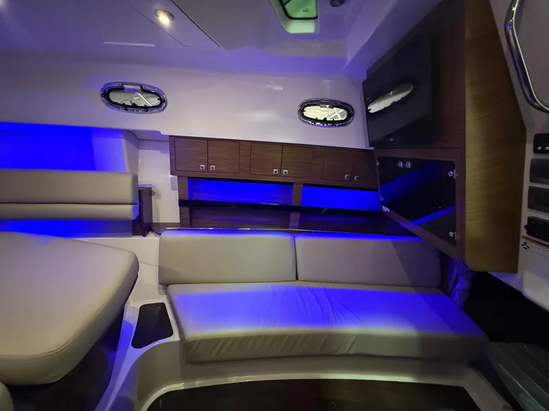 Slide: The Image of Luxurious interior of 2018 Boston Whaler 345 Conquest with blue ambient lighting. - 20