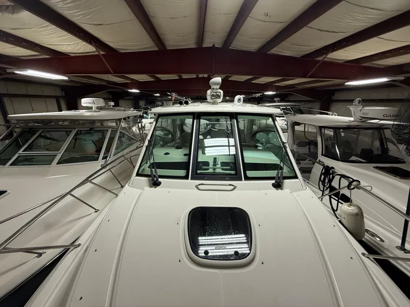 Slide: The Image of 2018 Boston Whaler 345 Conquest boat in indoor storage facility. - 23