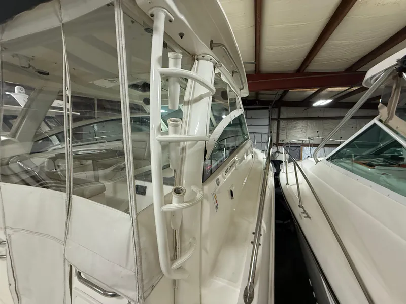 Slide: The Image of 2018 Boston Whaler 345 Conquest boat in storage, showcasing sleek design and spacious interior. - 8