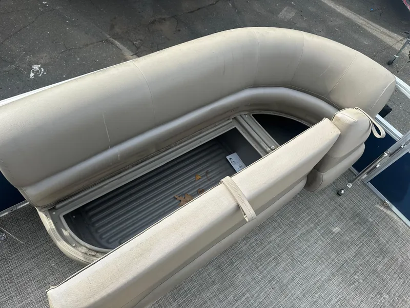 Slide: The Image of 2023 Ranger Reata 200C boat seat with storage compartment, beige upholstery. - 19