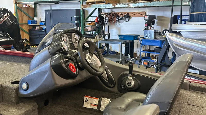 Slide: The Image of 2020 Tracker PRO175TXW boat dashboard in a workshop setting. - 7