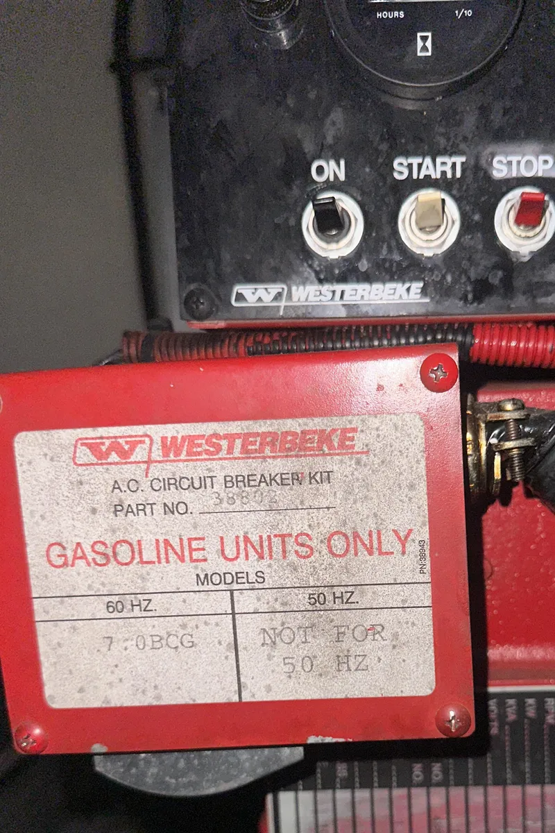 Slide: The Image of Westerbeke circuit breaker kit for gasoline units on 1995 Sea Ray 400 Express Cruiser. - 24