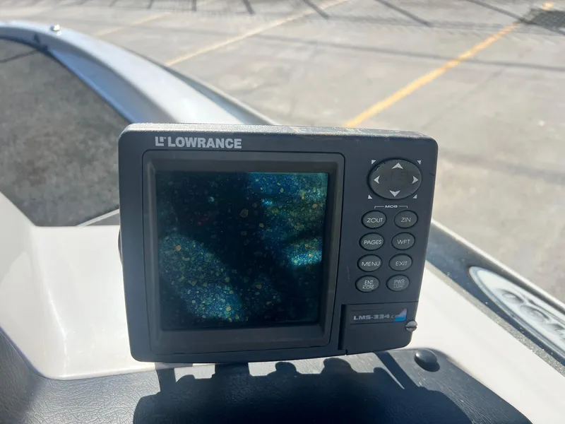 Slide: The Image of Lowrance fish finder on 2007 Skeeter ZX 190 boat dashboard. - 10