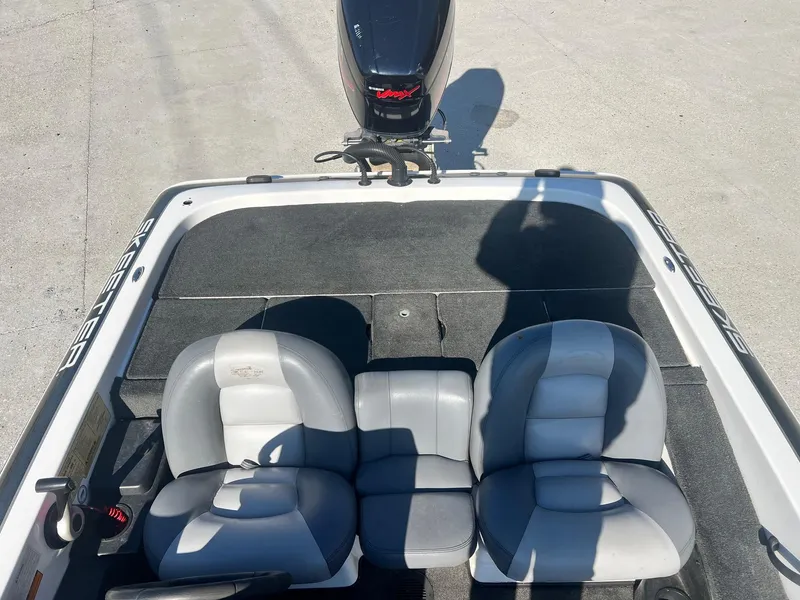 Slide: The Image of 2007 Skeeter ZX 190 boat interior with dual seats and motor, viewed from above. - 3